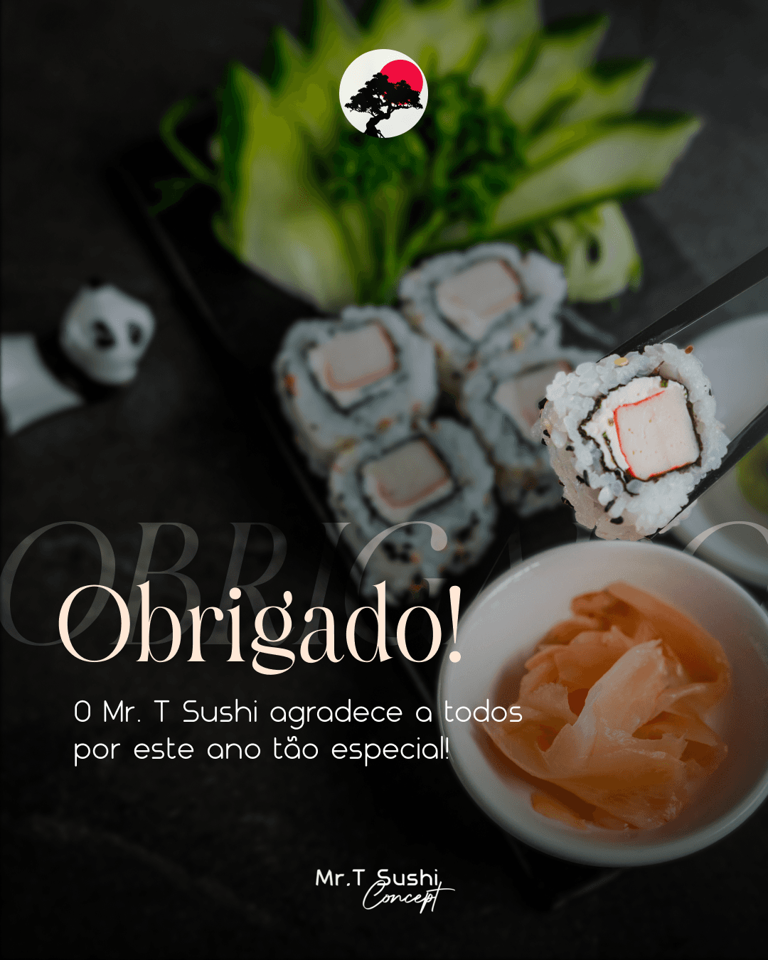A thank-you post reading Obrigado, over a dark platter of sushi with fresh greenery