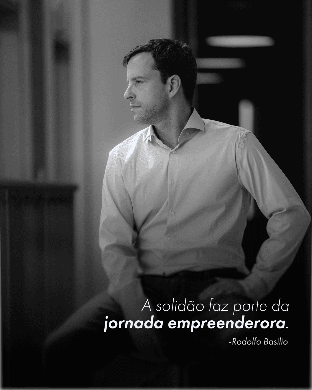 A black and white portrait of Rodolfo Basilio standing in profile, captioned with a quote about solitude being part of the entrepreneurial journey