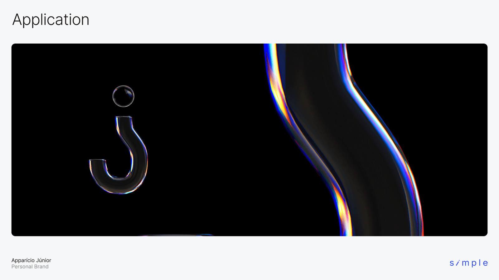 The j monogram rendered in chrome beside an iridescent ribbon on black